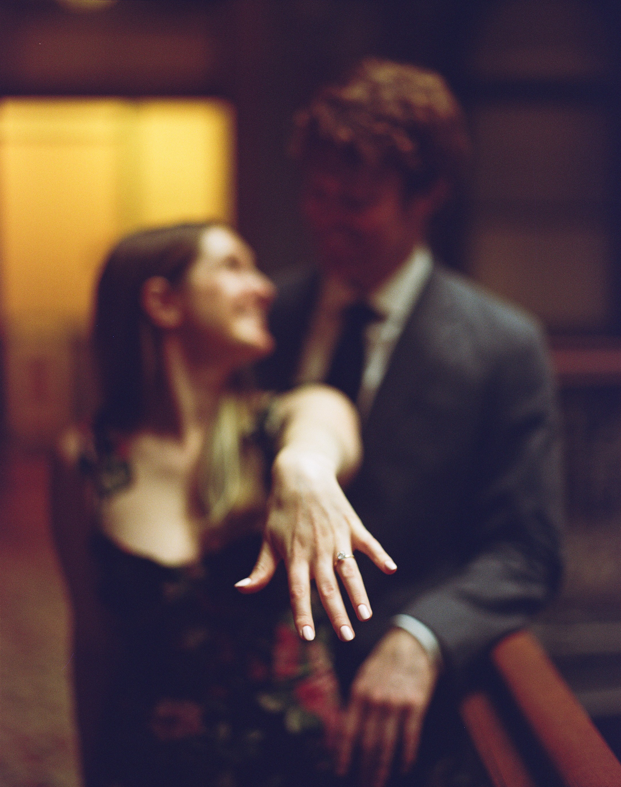 Close up of married couple's hands giving knuckles.