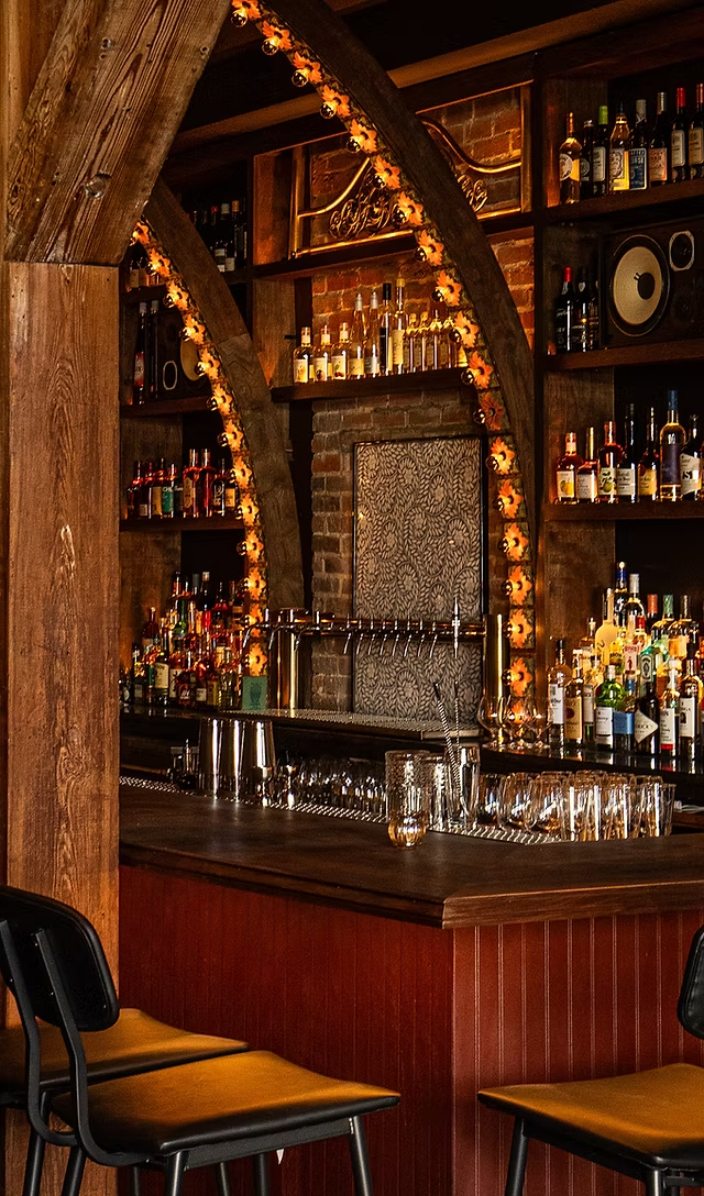 A dried flower rested upon wrinkled pieces of cloth paper.